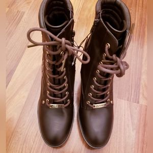 Guess dark brown boots in a size 9 nwot